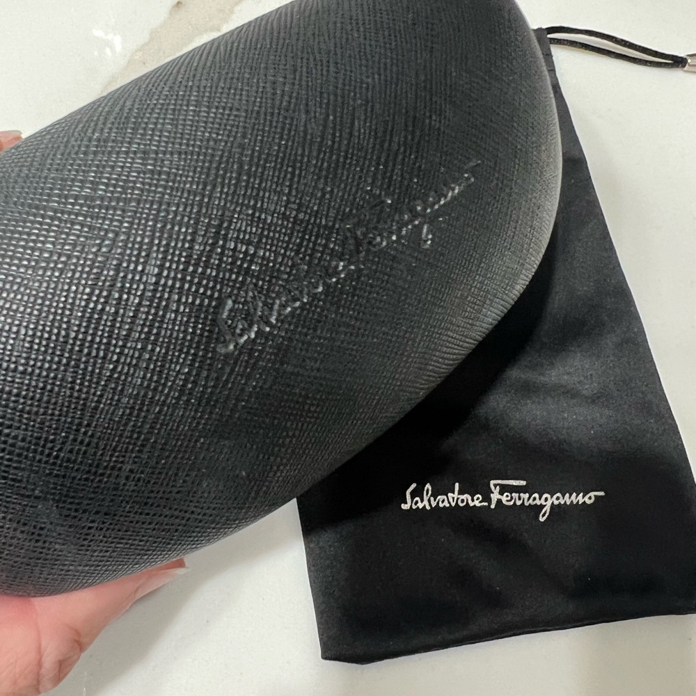 Salvatore Ferragamo Black clam shell sunglasses case and dust bag